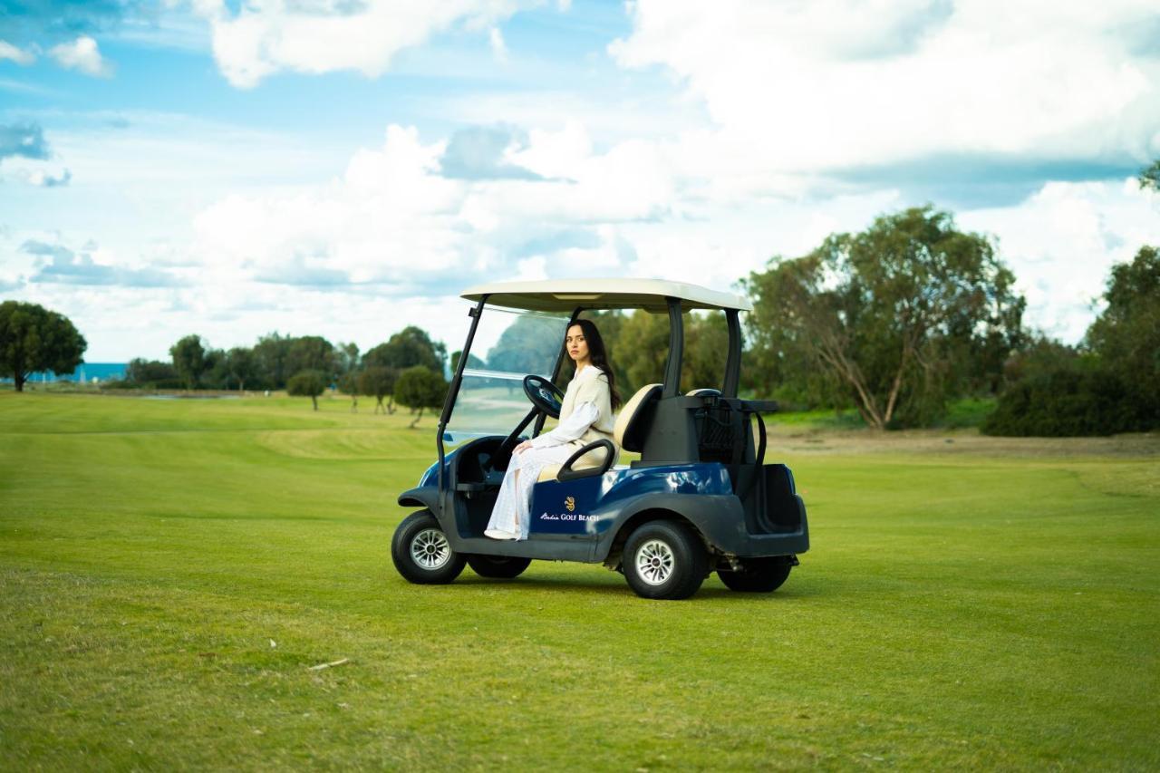 The View Bouznika Hotel Exterior photo Golf cart